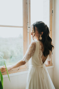 Rose robe de mariée en dentelle, élégante et romantique, signée Christelle Vasseur